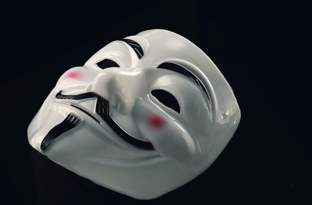 A Guy Fawkes mask, the symbol of the red hat hacker collective Anonymous
