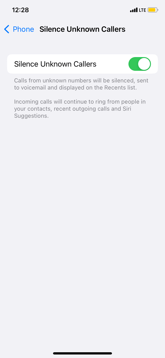 Screenshot of an iPhone enabling the Silence Unknown Callers feature