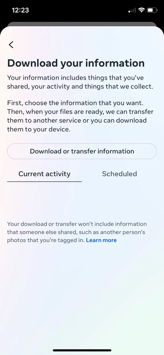 A screenshot of the iPhone Facebook app showing the option to download or transfer Facebook account information.