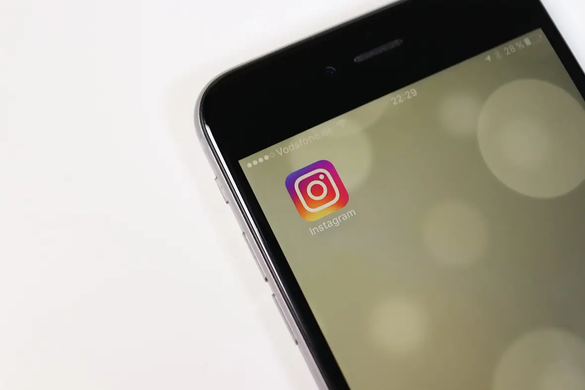 An image showing the Instagram app icon on a smartphone.