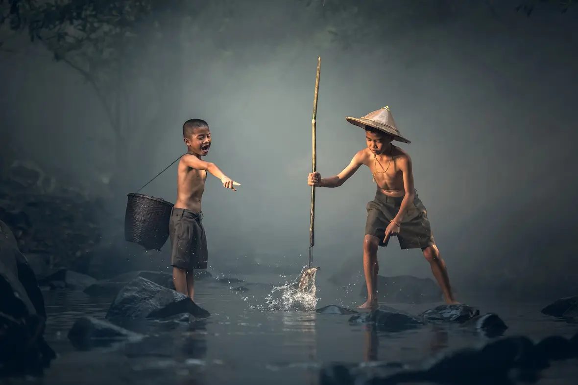 Two children fishing.