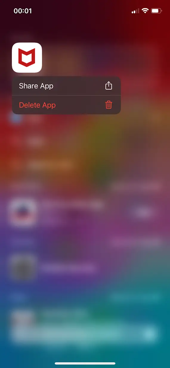 Screenshot of iPhone in the process of deleting McAfee Security app, Step 1.