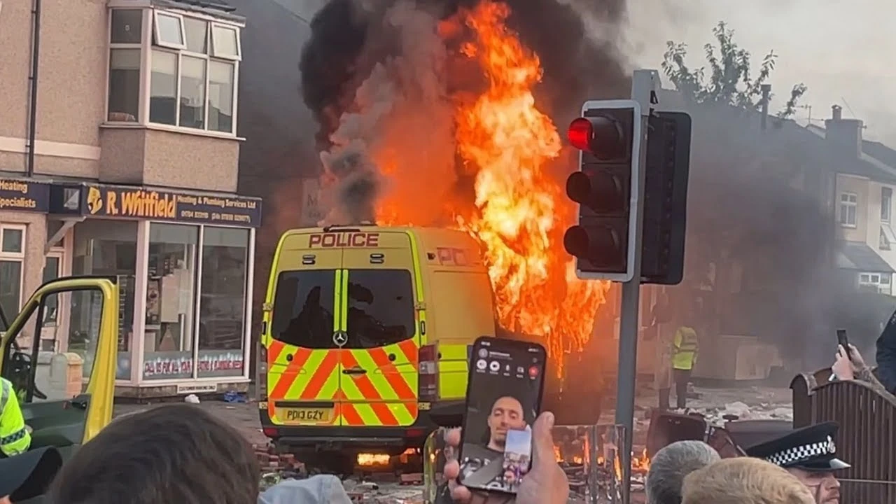 Image of a van on fire during the 2024 Southport Riots in the UK.