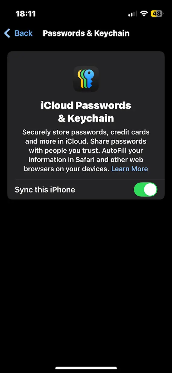 A screenshot of the iCloud Passwords & Keychain settings with the option to Sync this iPhone.