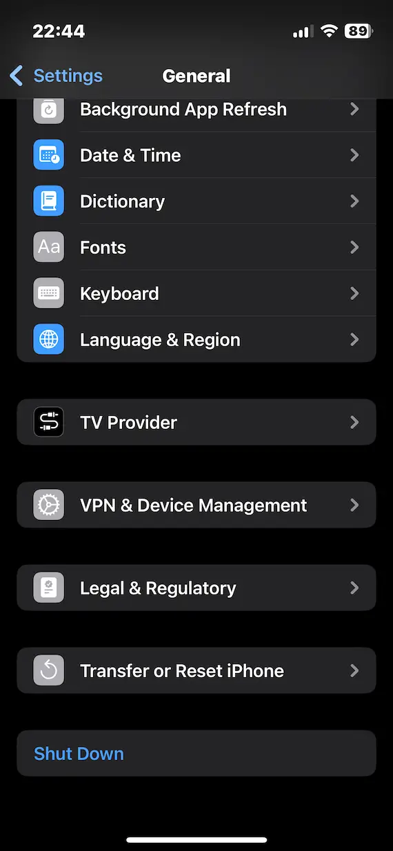 A screenshot of the General Settings page in iOS with the Transfer or Reset iPhone option.