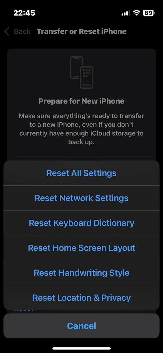 A screenshot of the Transfer or Reset iPhone page in iOS with a pop-up showing the option to Reset All Settings.