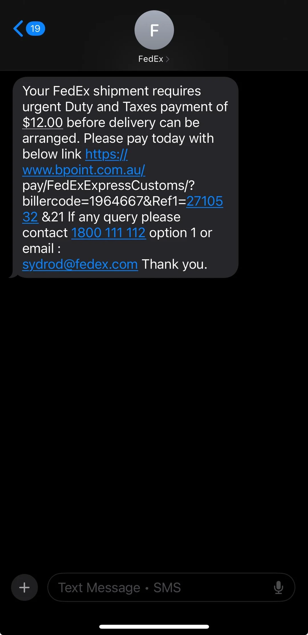 A screenshot of a text message associated with a FedEx import duty scam.