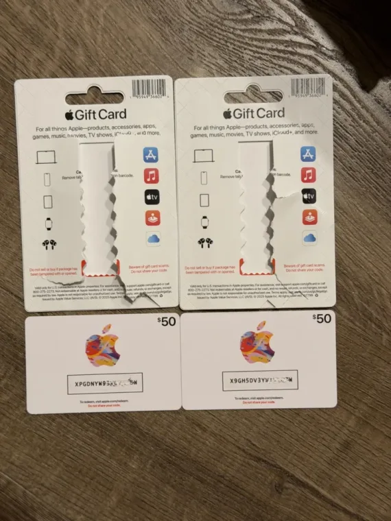 A photo showing a Apple gift cards that have been tampered with.