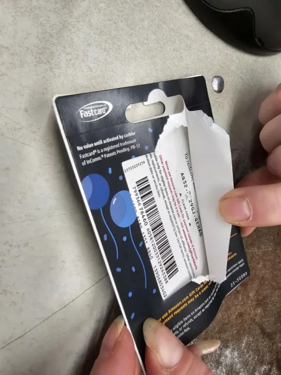 A photo showing a gift card that has been tampered with.